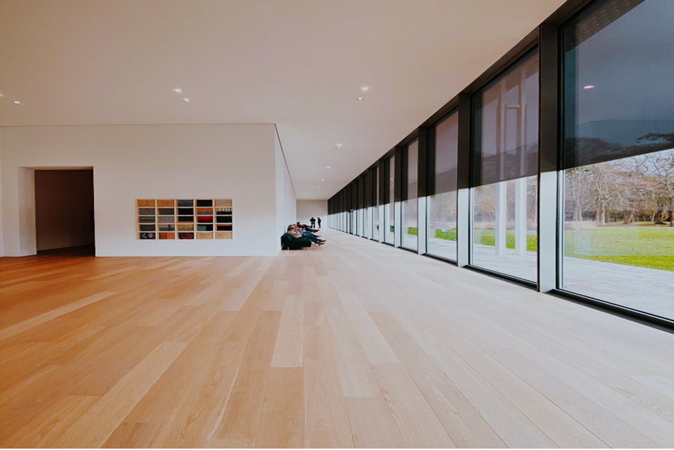 Large hallway with beautiful laminate flooring